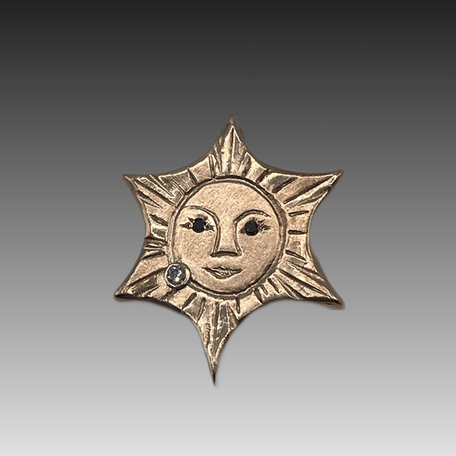 9ct yellow gold Sun with Black & White Diamonds